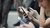 People holding phones